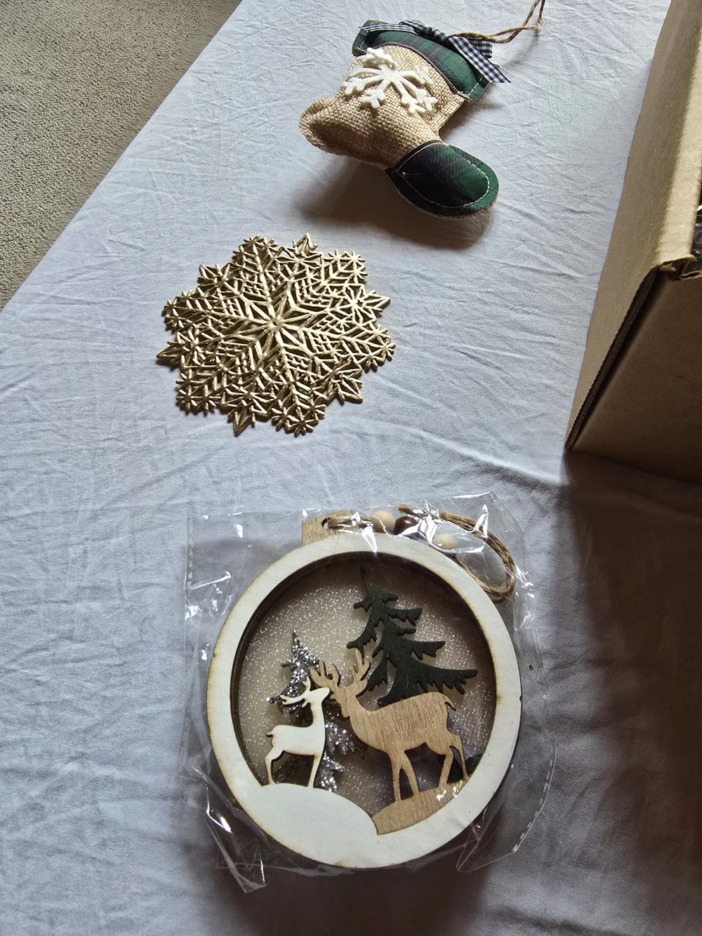 Holiday Home Gift Box with Cream Knit Throw and Green Ribbon Accents